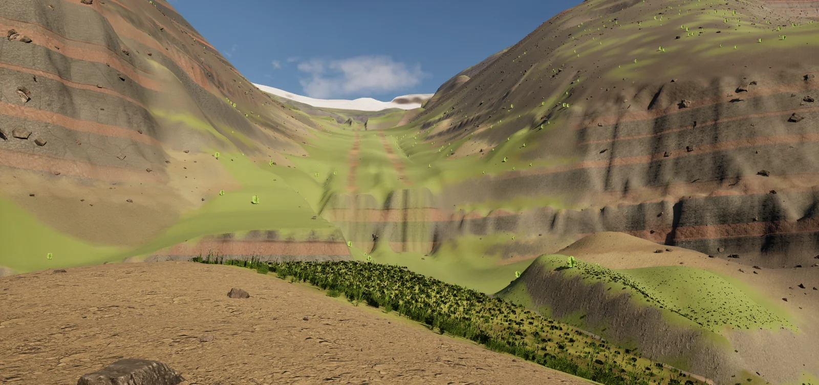 A valley between banded walls