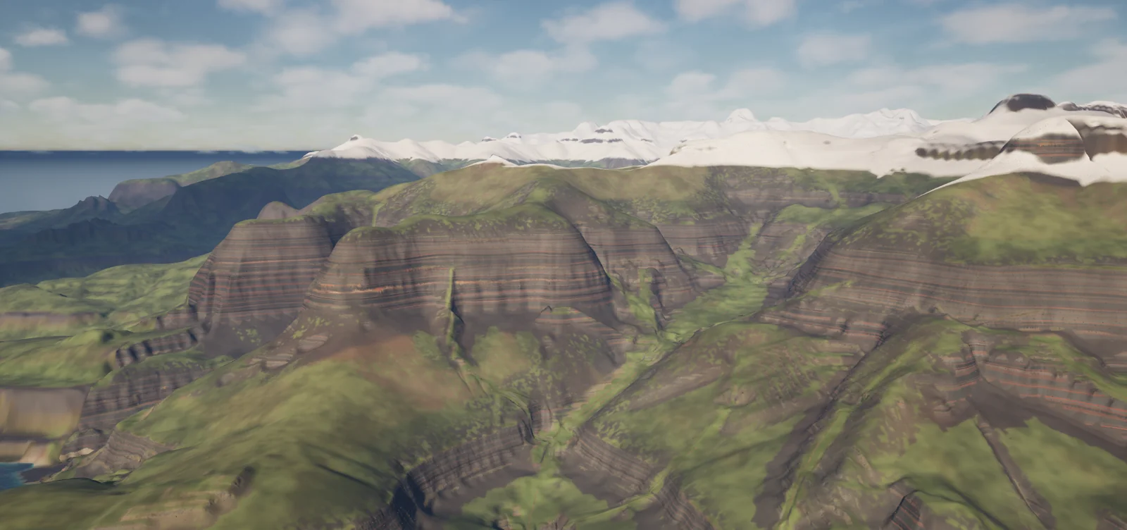 Cliffs and green slopes from above